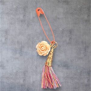 ARATTA SILENT JOURNEY TASSELED FLORAL PIN